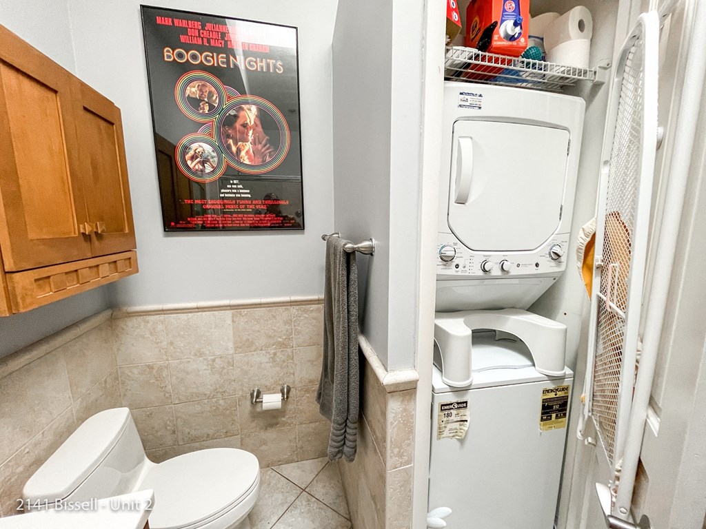 a small bathroom with a washer and dryer