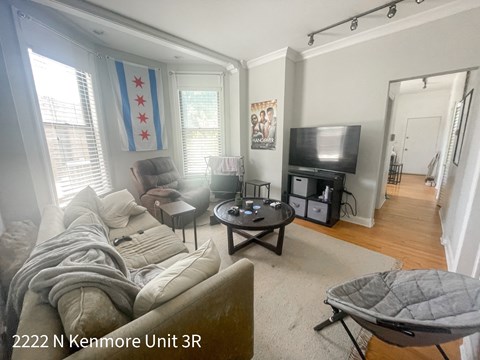 a living room with a couch and a tv