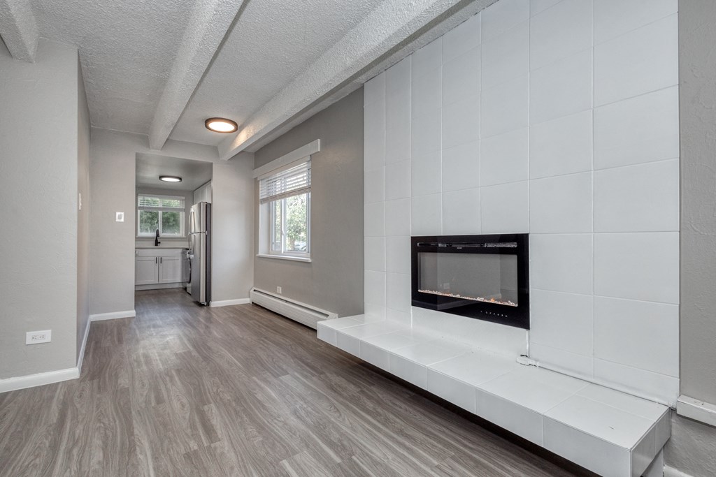 the living room of a home with a fireplace
