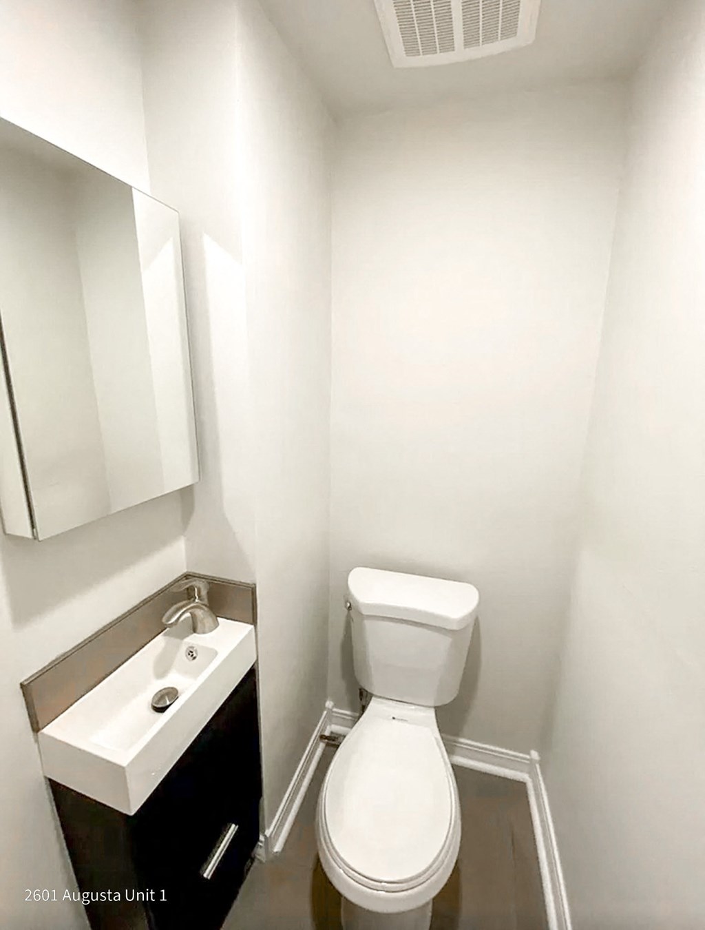 a small bathroom with a toilet and a sink