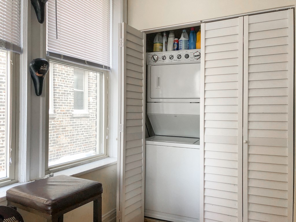 Washer and dryer in a closet.