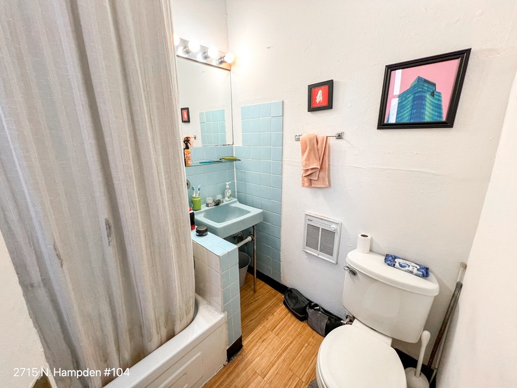 a small bathroom with a toilet and a sink