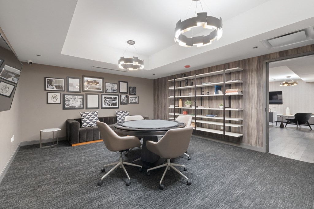 a room filled with furniture and a large window