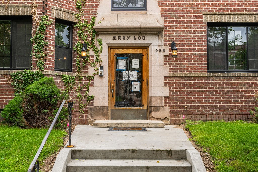 a brick building with a wooden door