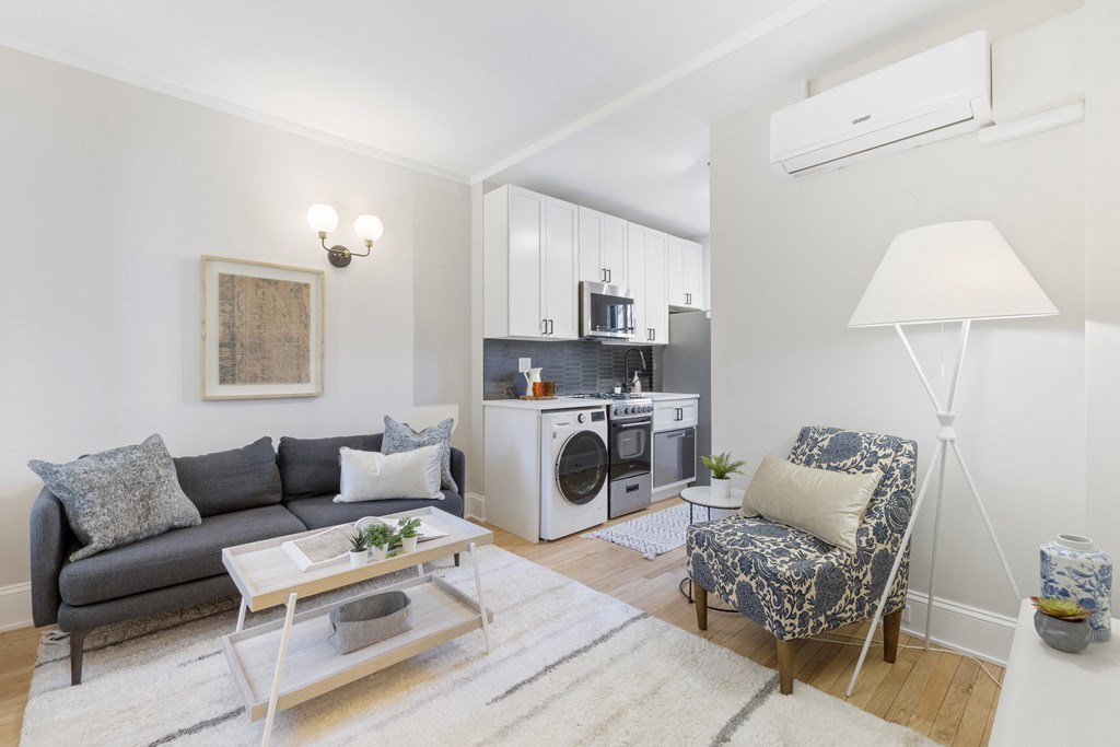 a living room with a couch and a chair