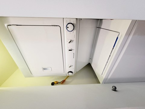 an overhead view of a microwave oven in a kitchen