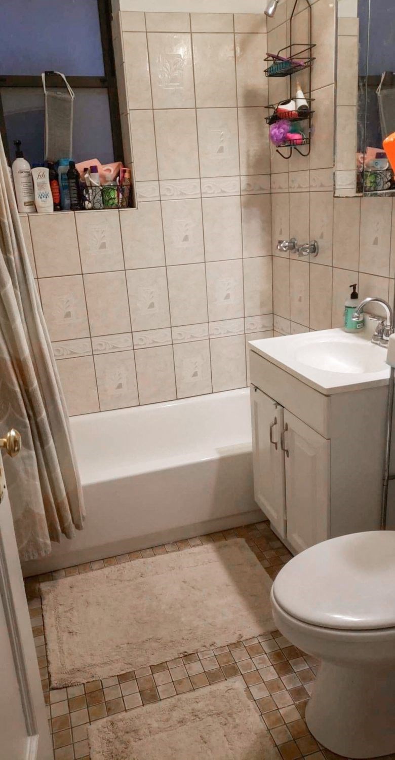 a bathroom with a sink toilet and a bath tub