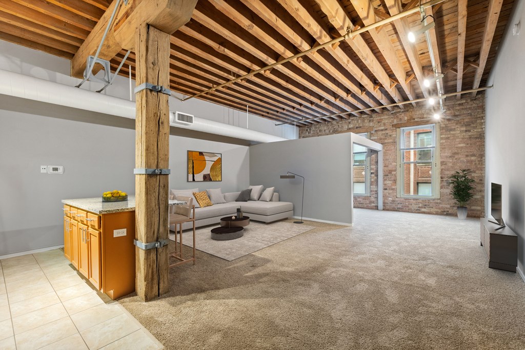 a living room with a couch and a table