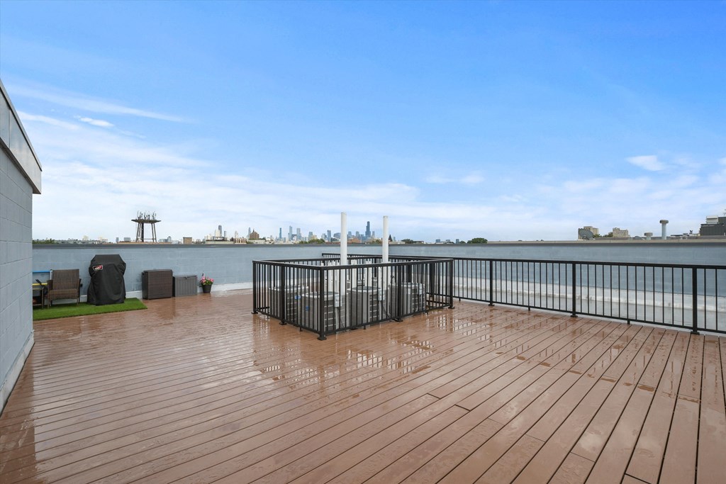 a large deck with a view of the water