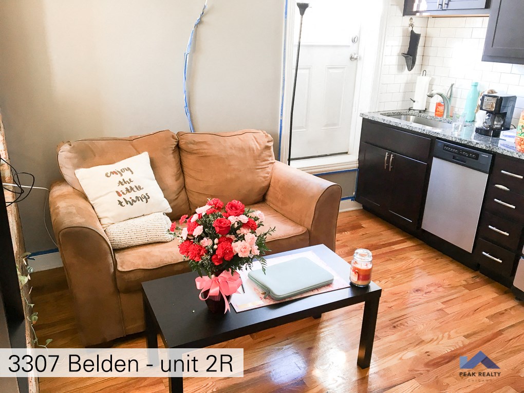 a living room with a couch and a coffee table