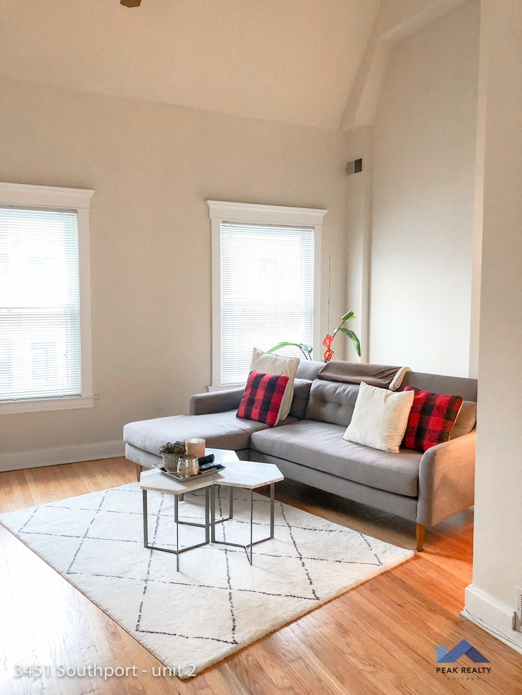 a living room with a couch and a coffee table