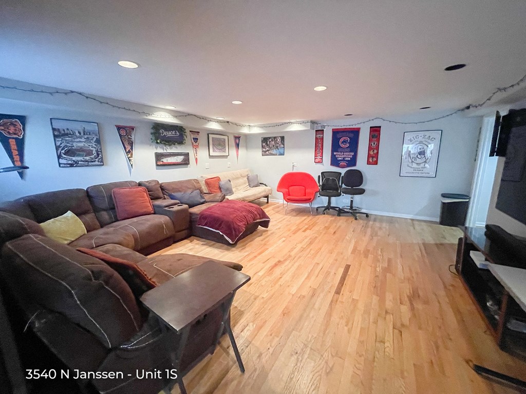 a living room filled with couches and chairs
