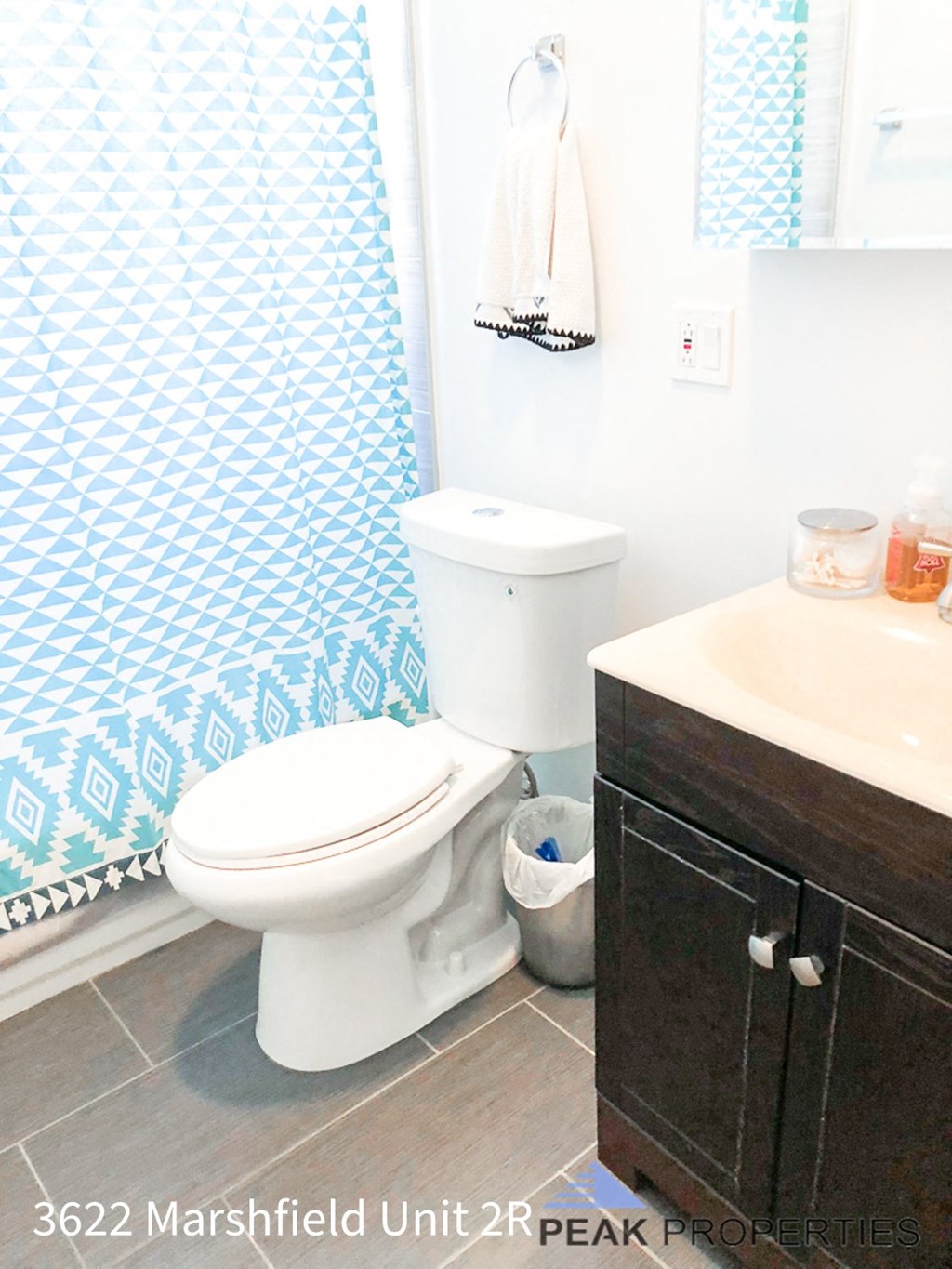 a bathroom with a toilet and a sink