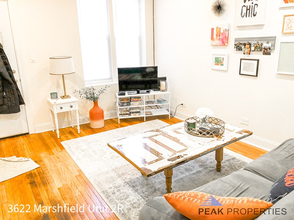 a living room with a couch and a coffee table