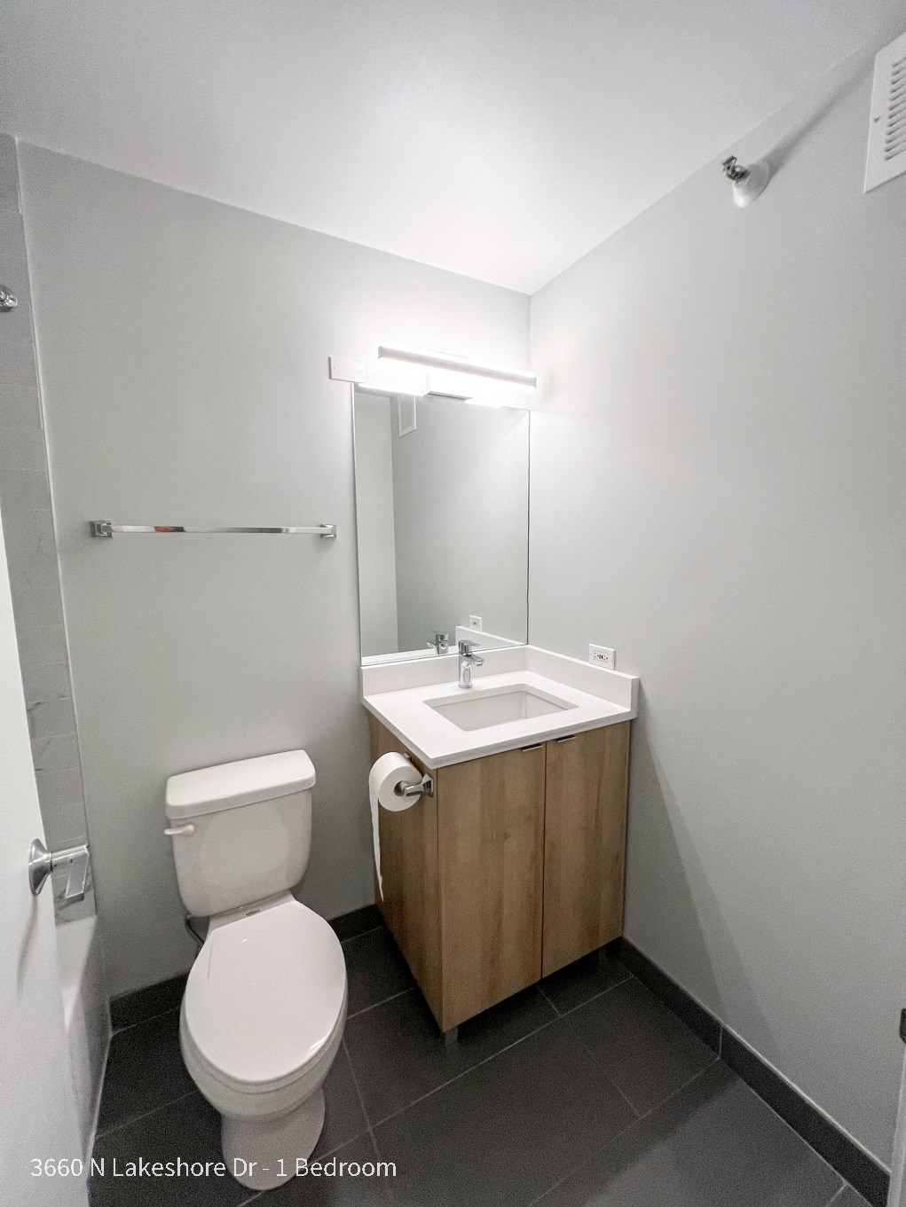 a small bathroom with a toilet and a sink