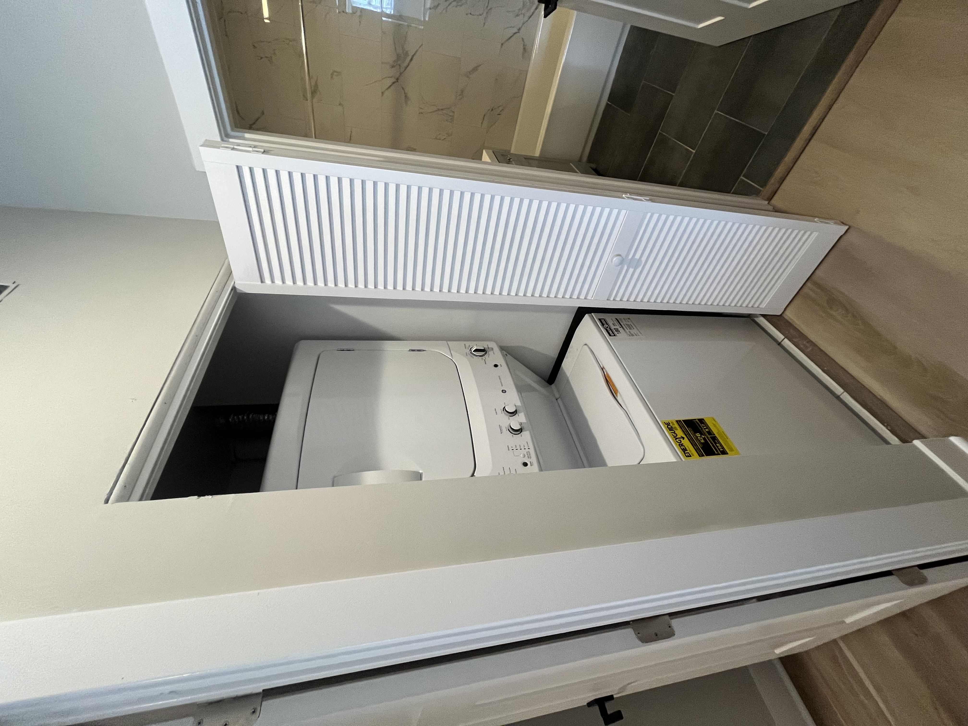 an overhead view of a drawer with a toilet in it