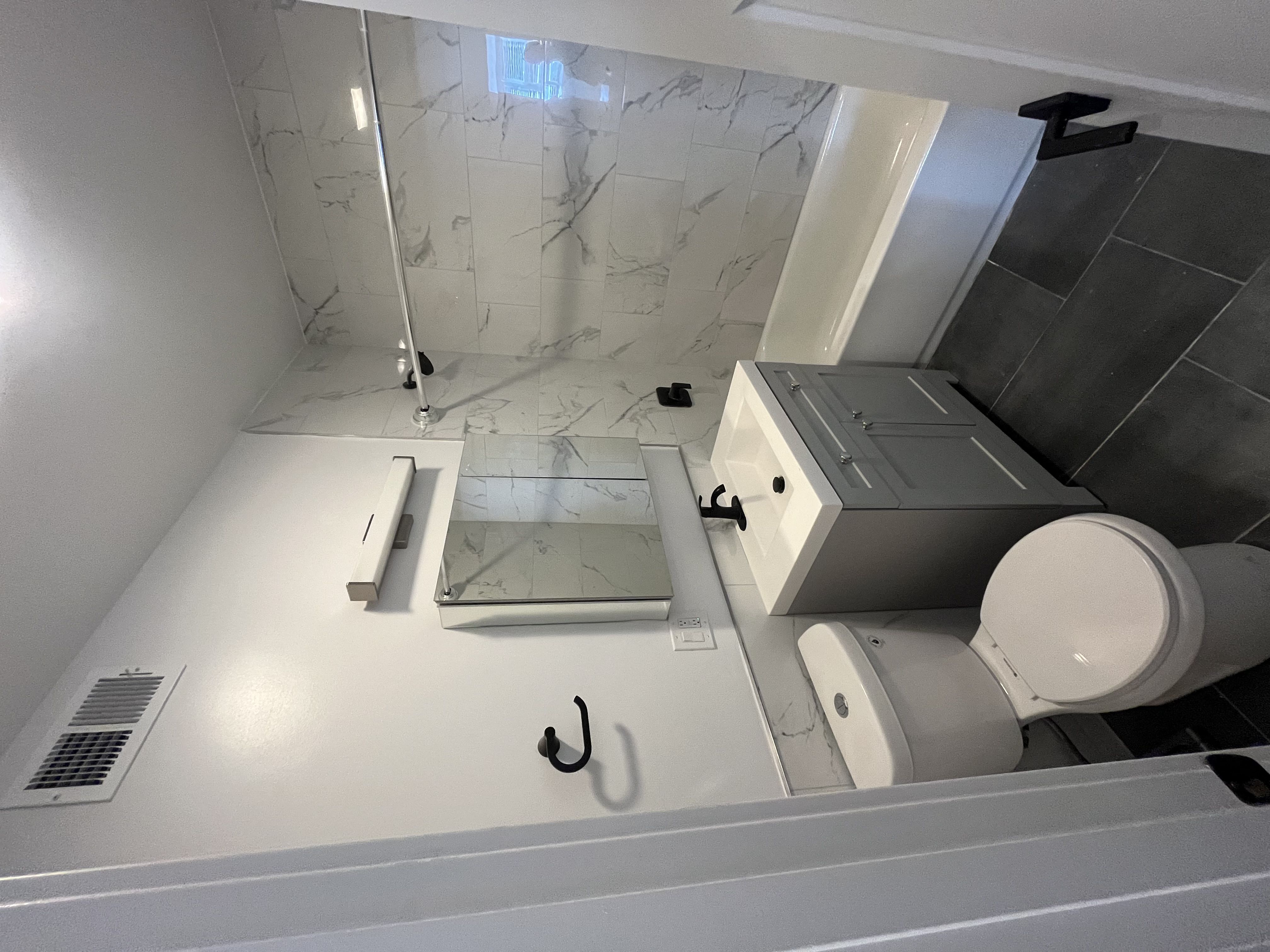 a small bathroom with a toilet and a sink