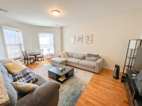 a living room with a couch and a coffee table