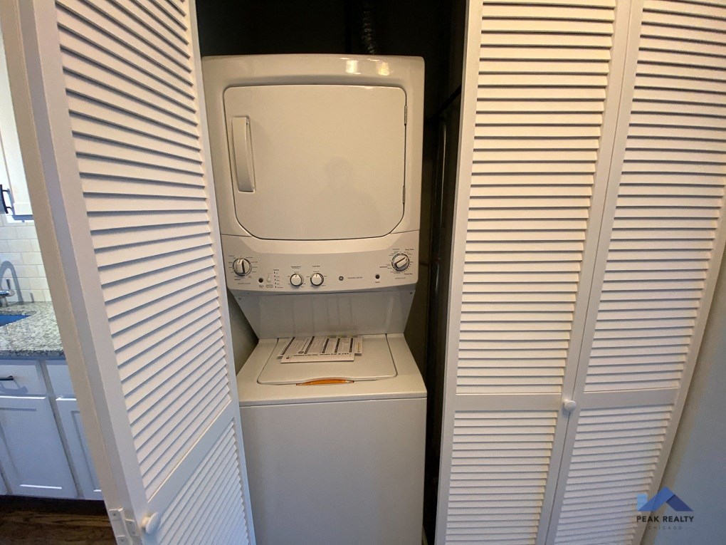 a washer and dryer in the closet