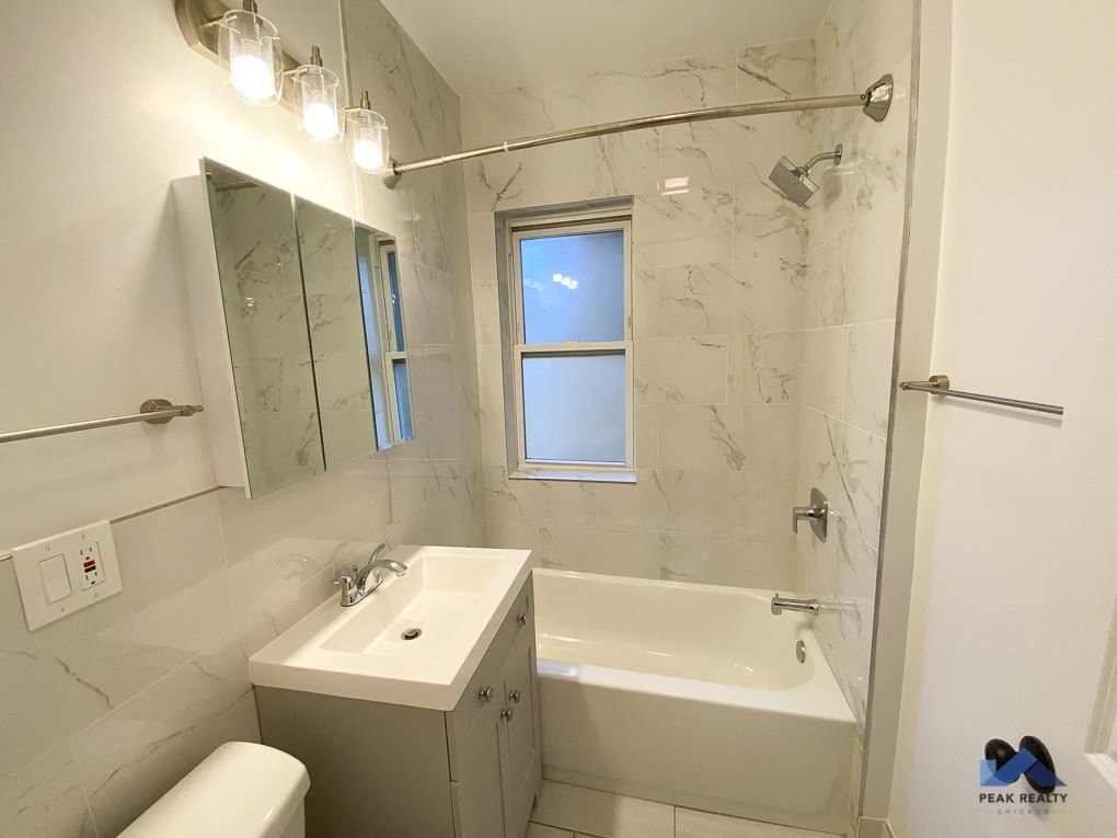 a bathroom with a sink and a bathtub