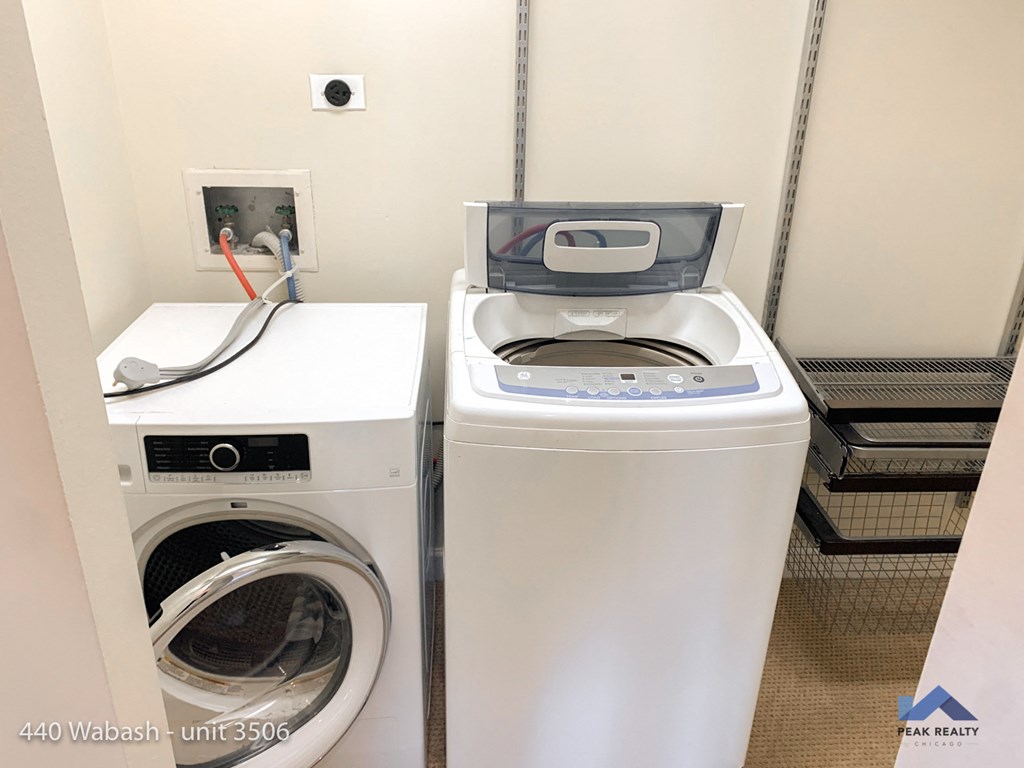 a washer and a dryer in a room with a washing machine