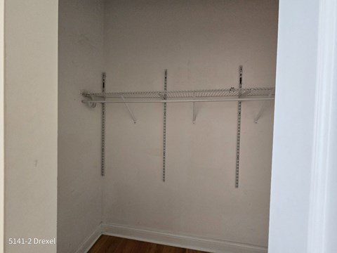 a room with a wall with a bunch of stickers on it