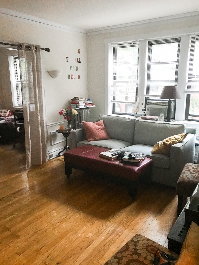 a living room with a couch and a coffee table
