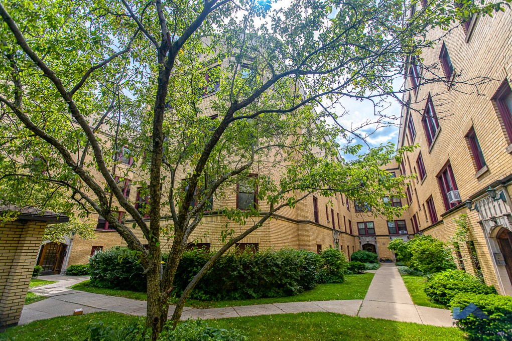 Brick building with treeline
