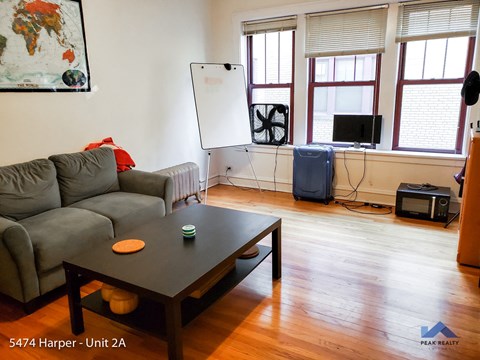 a living room with a couch and a coffee table