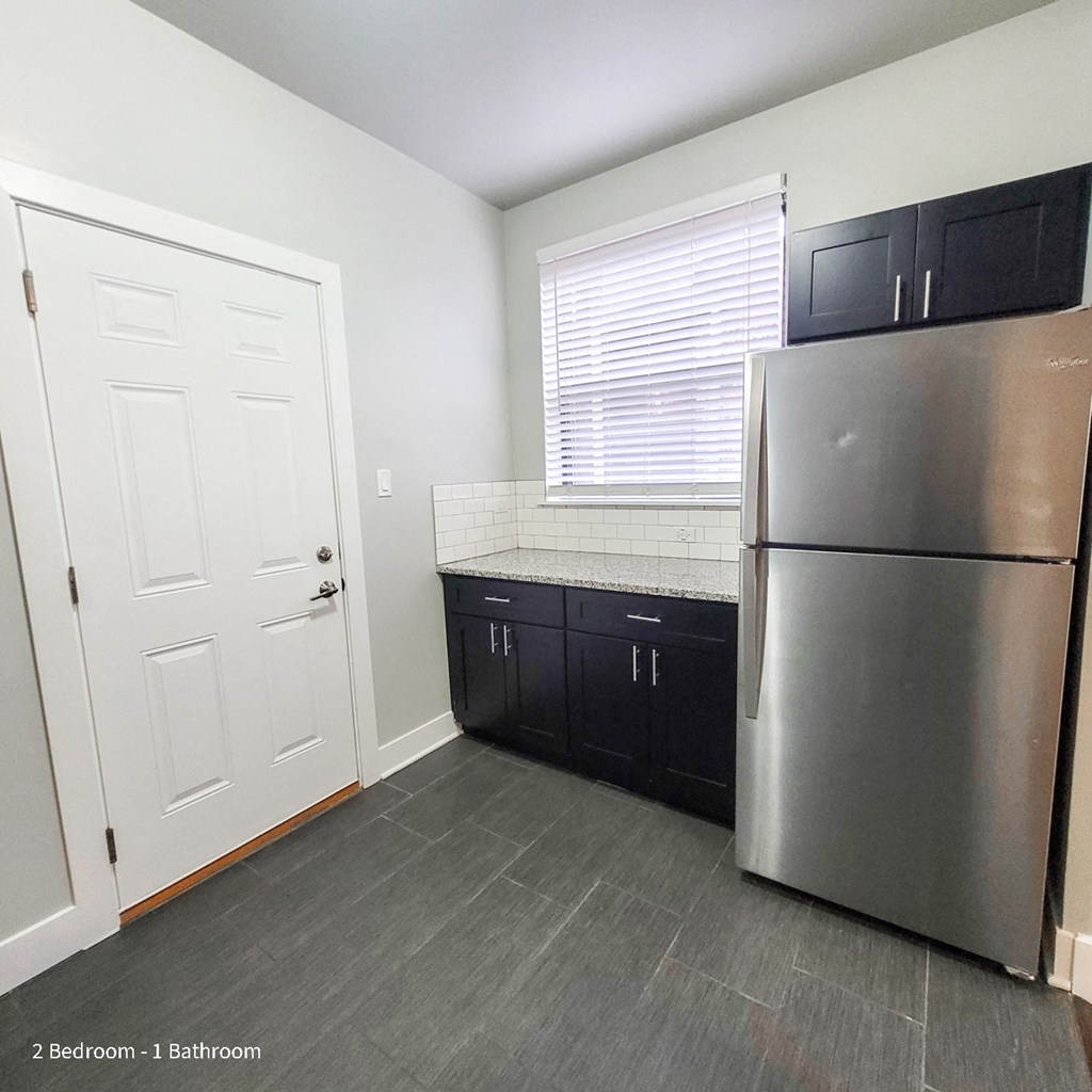 A modern high-rise building located at 5501 S Everett, Chicago Apartments. Explore luxury living with Peak Properties.