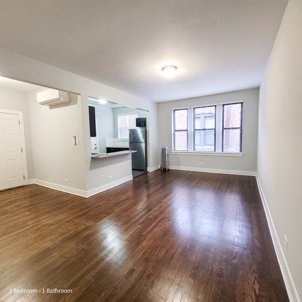 A modern high-rise building located at 5501 S Everett, Chicago Apartments. Explore luxury living with Peak Properties.