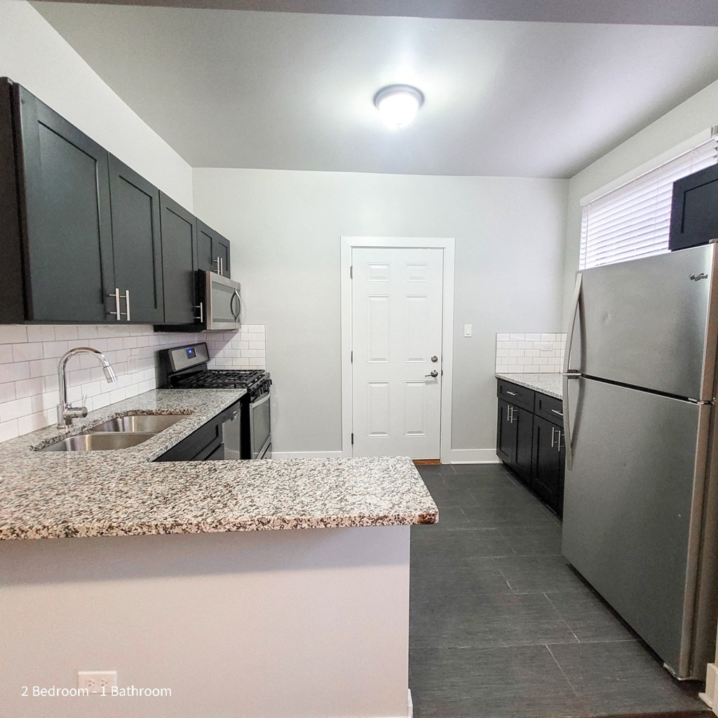 A modern high-rise building located at 5501 S Everett, Chicago Apartments. Explore luxury living with Peak Properties.