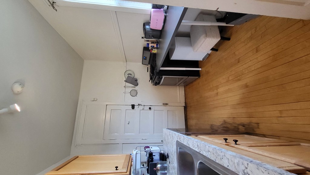 a view of the kitchen from the loft