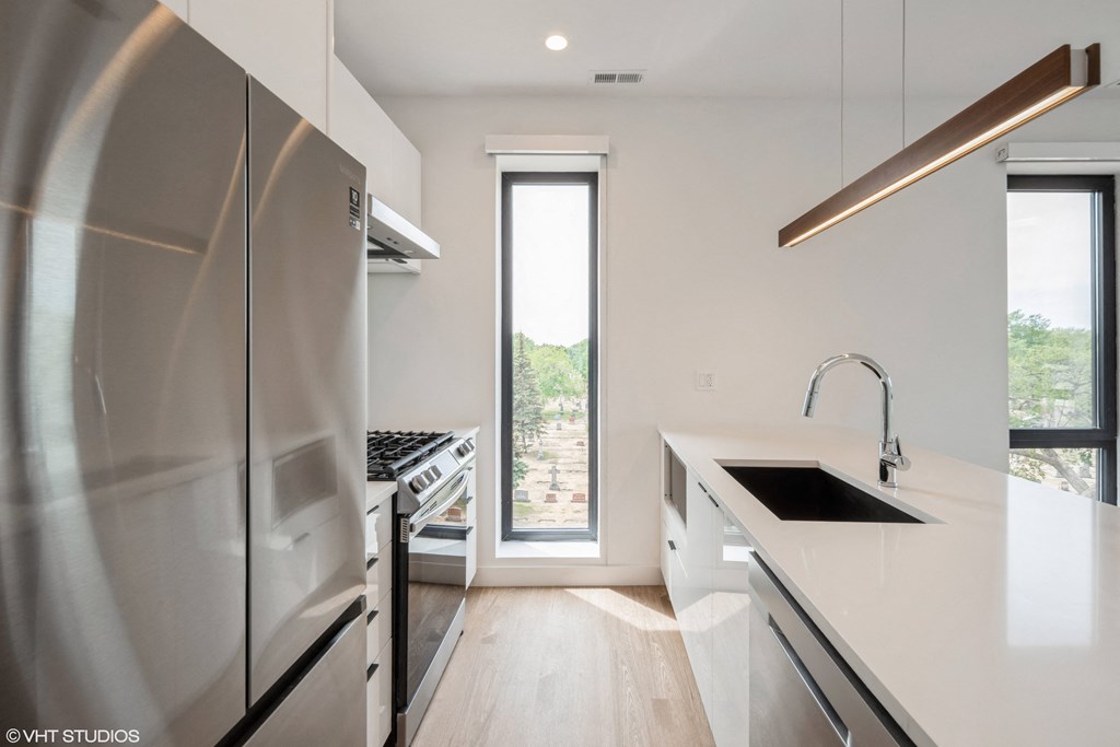 Stainless steel appliances newly renovated kitchen