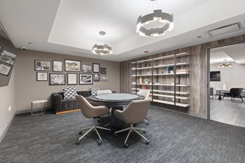 a room filled with furniture and a large window