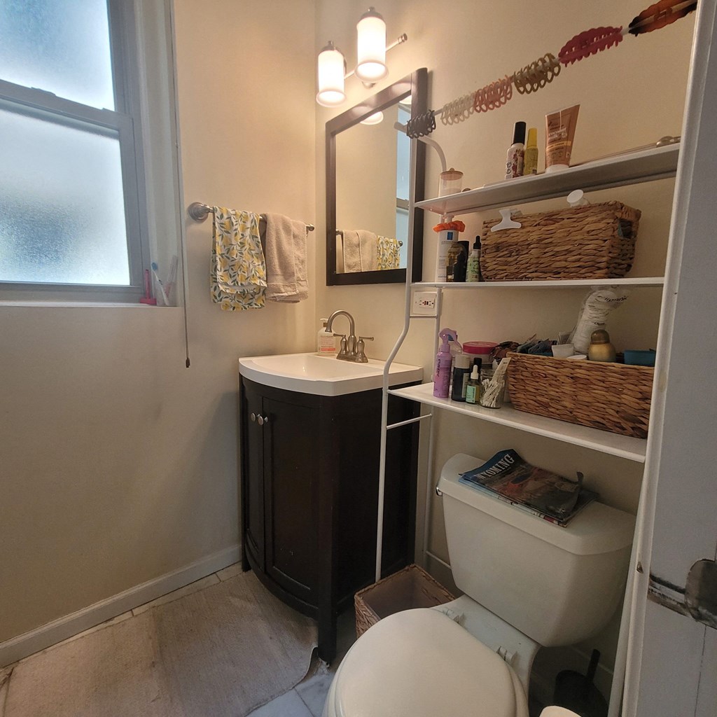 a small bathroom with a toilet and a sink