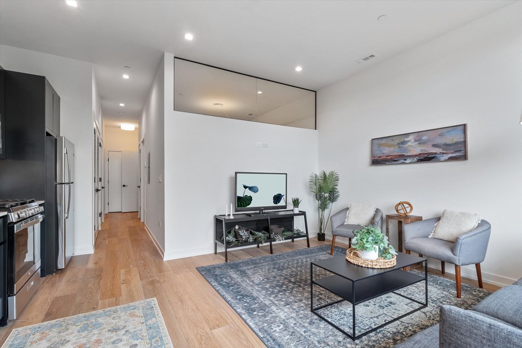 a living room with a couch and a table