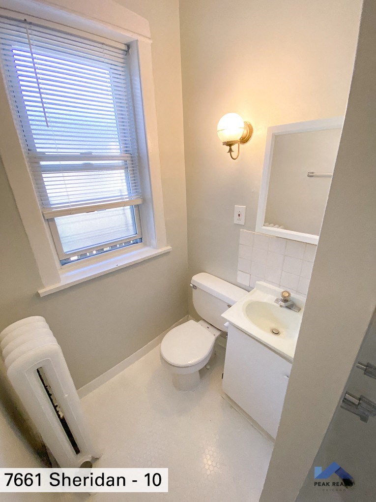 a small bathroom with a toilet and a sink