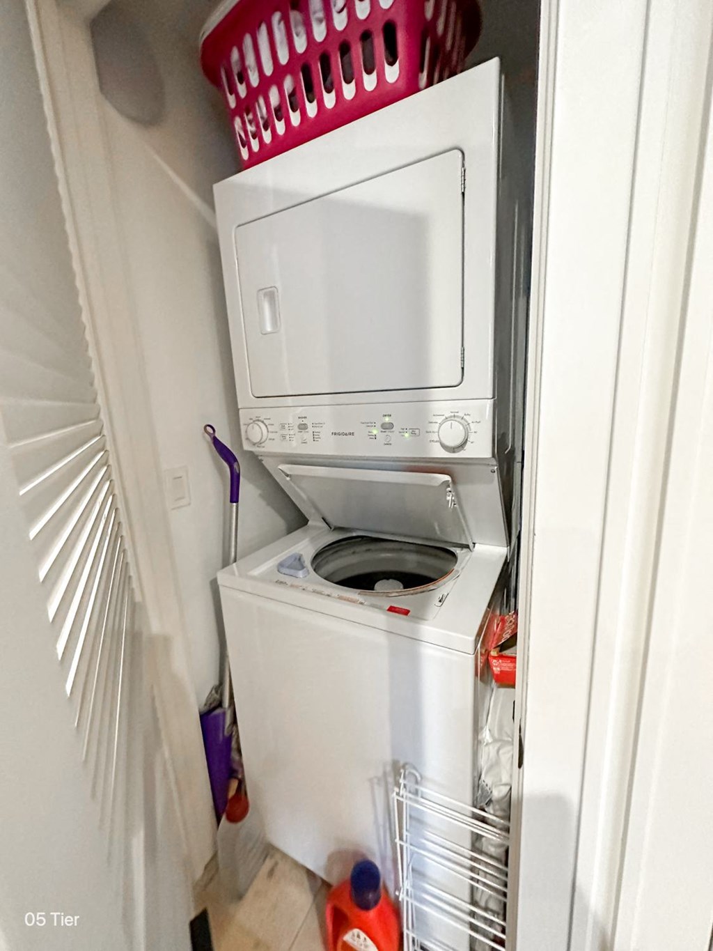 a small laundry room with a washer and dryer in it