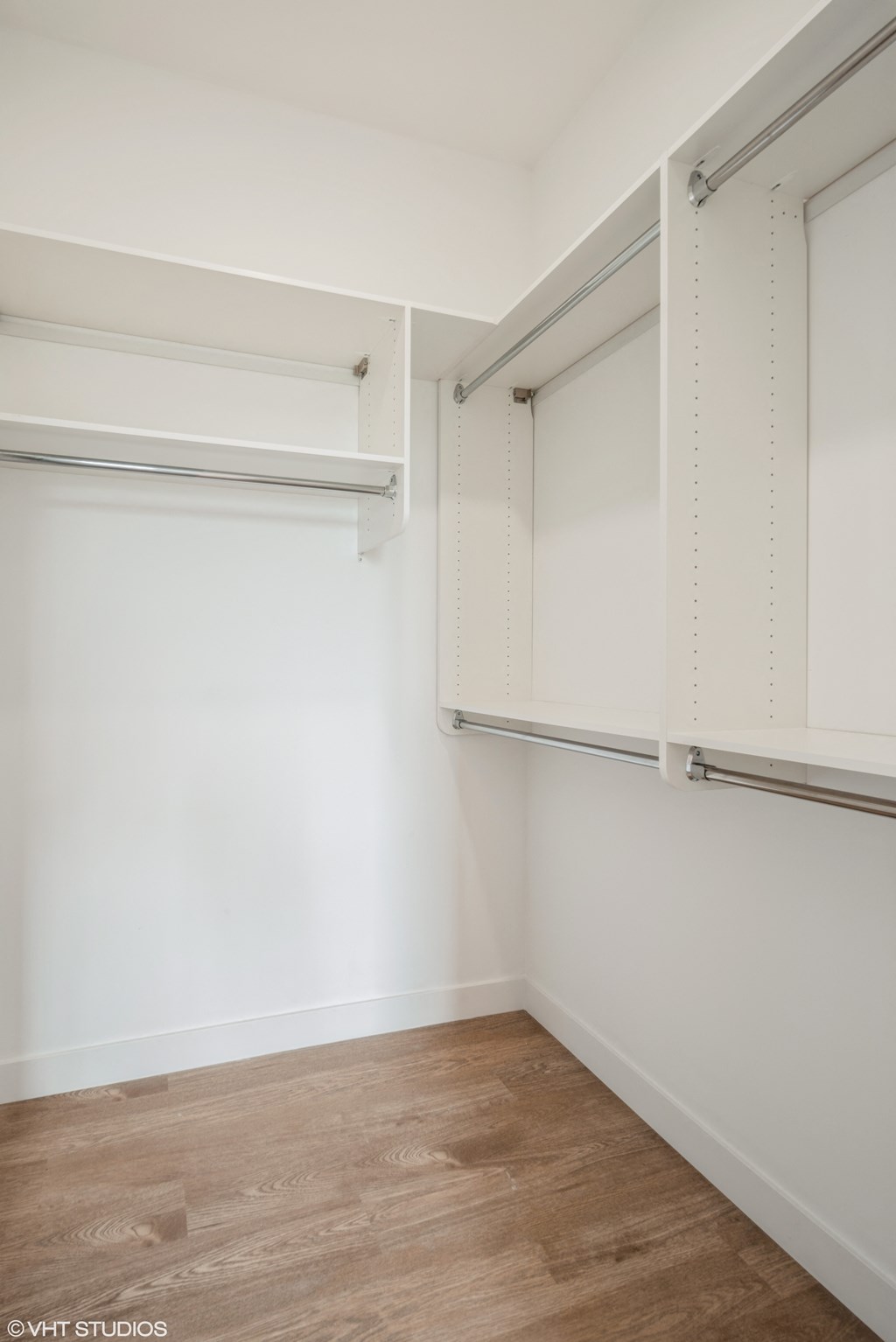 spacious walk-in closet in large bedroom