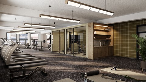 Onsite 24 hour fitness center with a variety of equipment including treadmills, weights, and exercise machines.