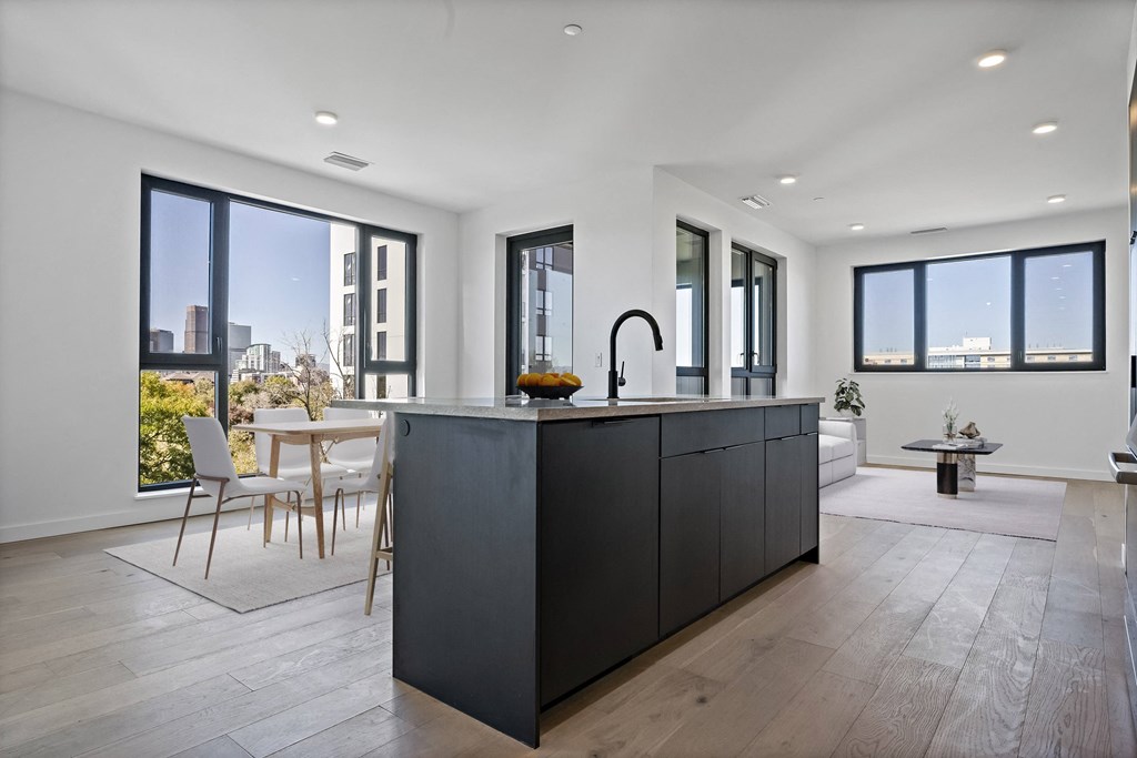 a large kitchen with a large island in the middle of it