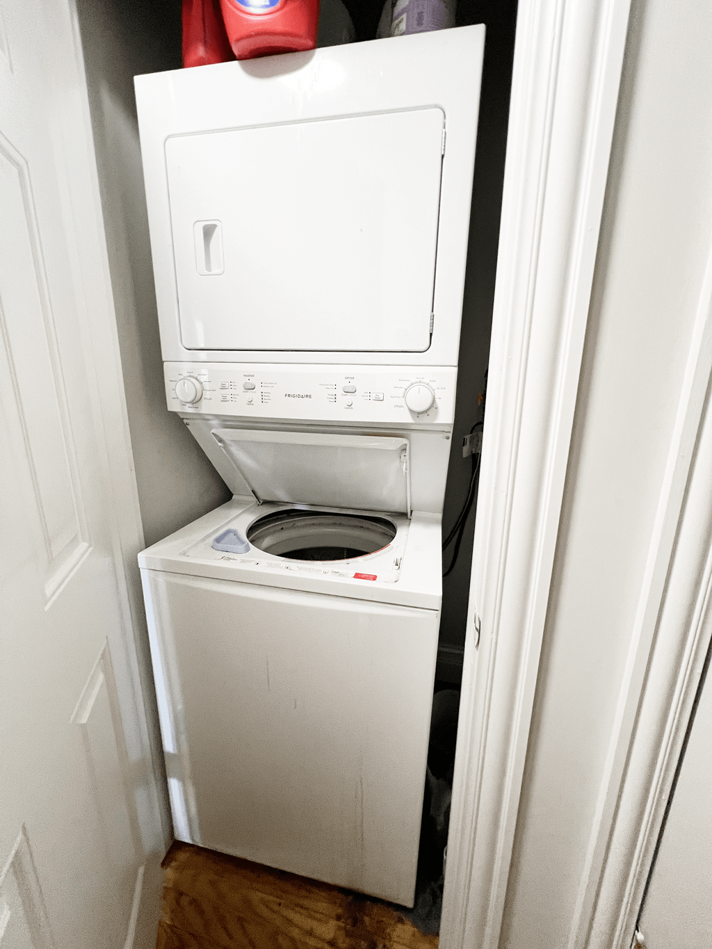 a small laundry room with a washer and dryer in it