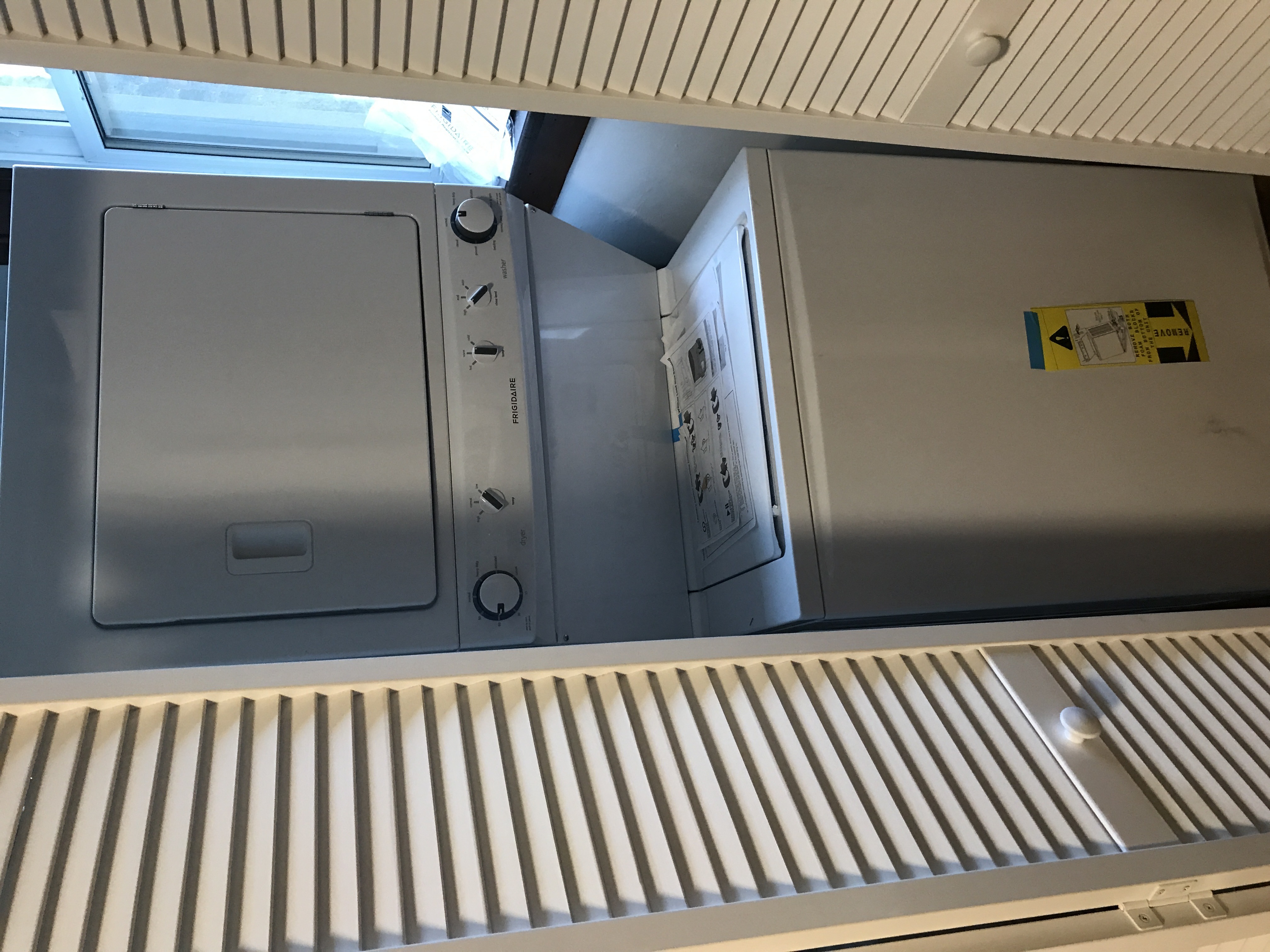 the inside of a refrigerator with its door open