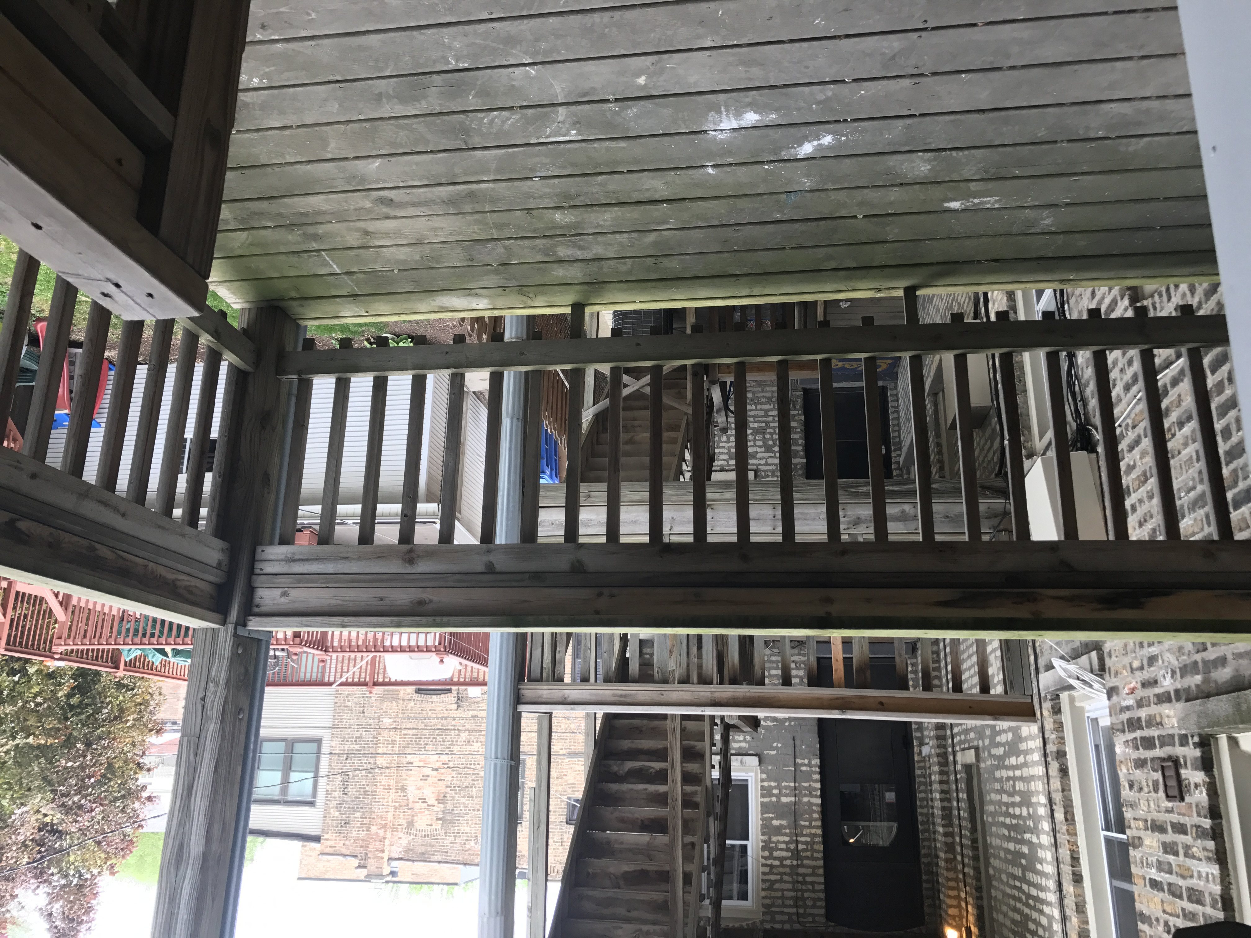 a view of the underside of a deck with a staircase