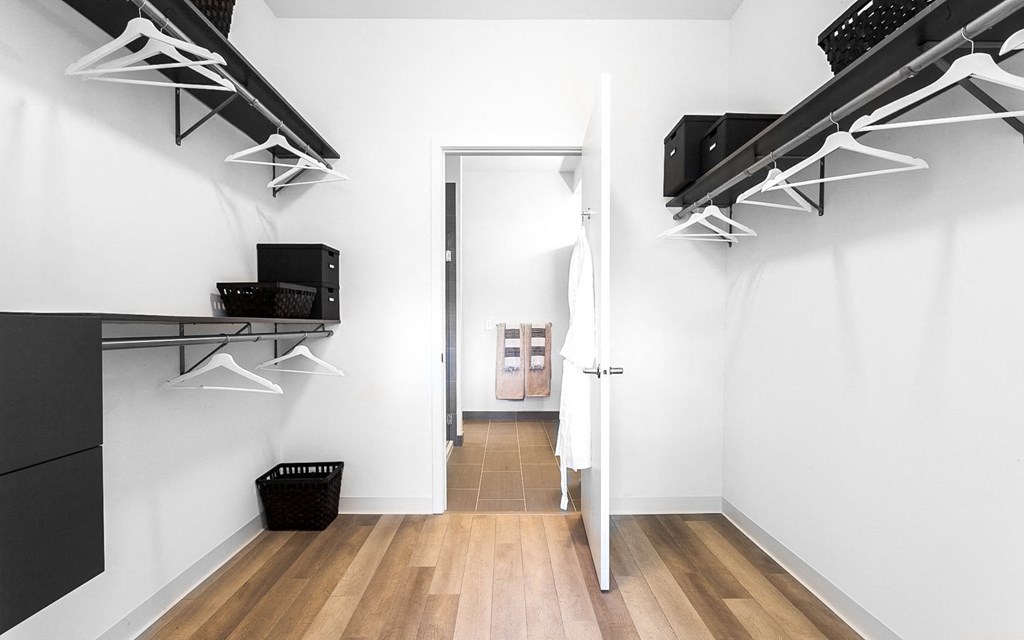 Closet at L Logan Square Apartments, providing ample storage space for clothing and accessories, ensuring a clutter-free and well-organized living environment.