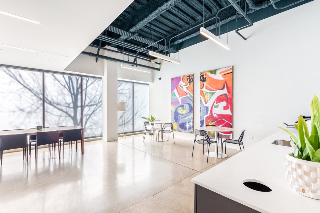 Community amenity area showcasing a vibrant and colorful abstract painting in the background.