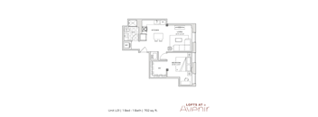 A floor plan of an apartment at Lofts at Avenir showing a bedroom, living room, kitchen, and bathroom.