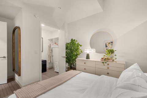 Walk in closets with organizers offer great storage solutions.