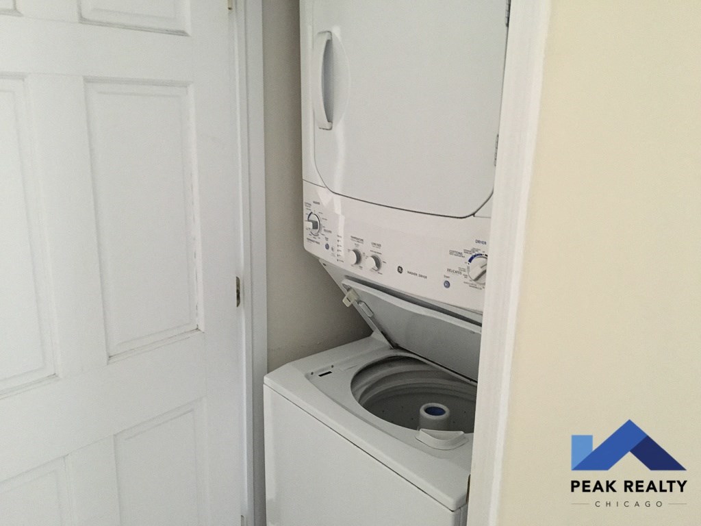 the laundry room has a washer and dryer